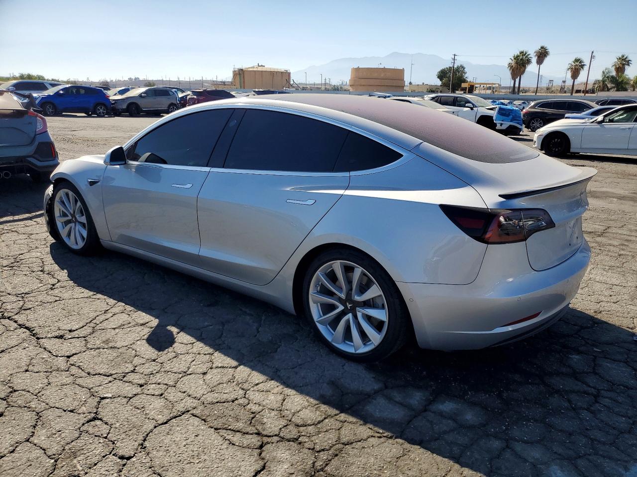 5YJ3E1EA4HF002482 · 2017 TESLA MODEL 3 · 2/12