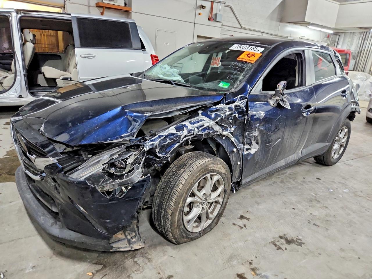 JM1DKFB71M1503304 · 2021 MAZDA CX-3