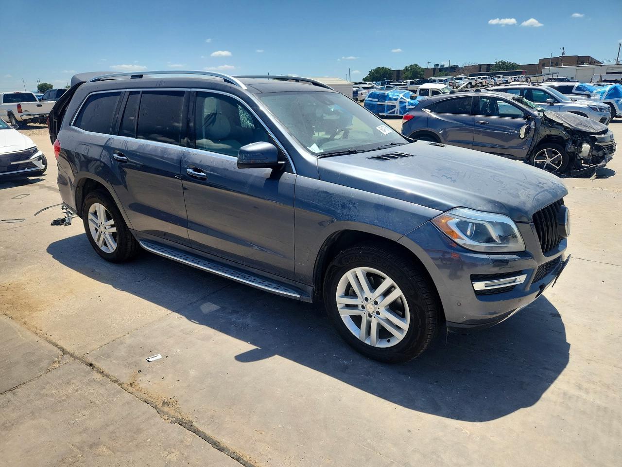 4JGDF6EE2FA479298 · 2015 MERCEDES-BENZ GL · 4/14