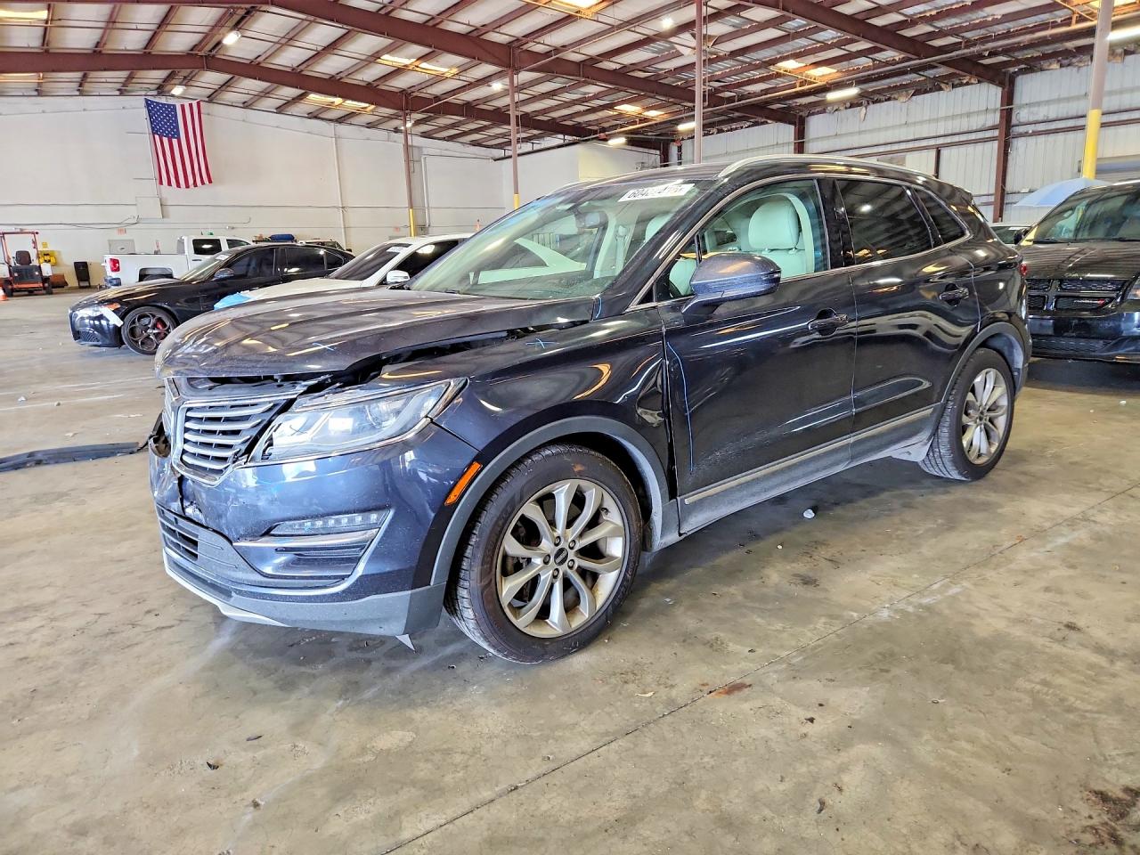 5LMCJ1A91FUJ08828 · 2015 LINCOLN MKZ
