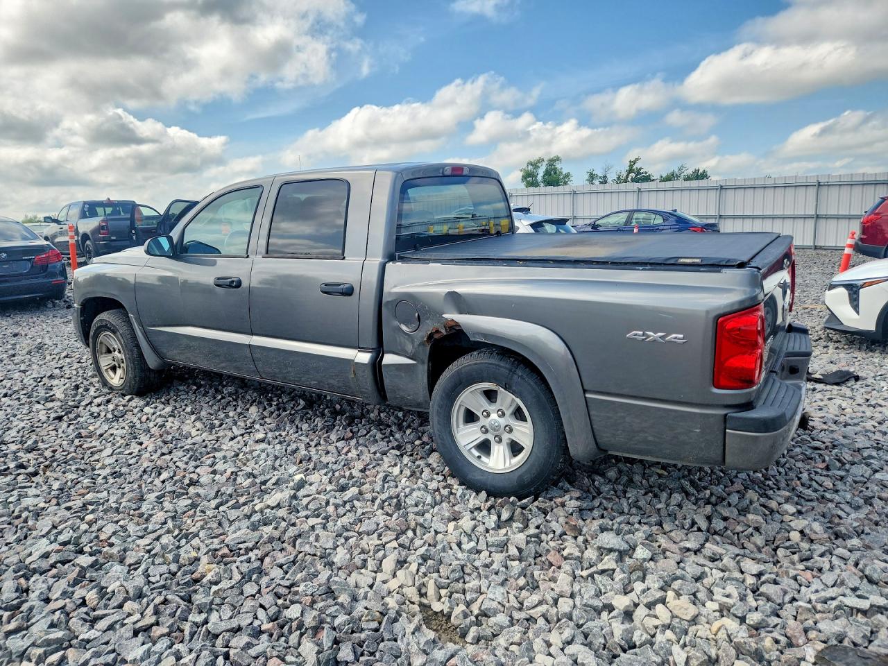 1D7RW3GK1BS676436 · 2011 DODGE DAKOTA · 2/12