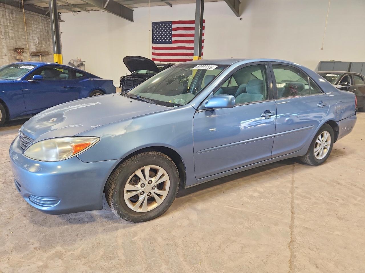 4T1BF32KX4U587907 · 2004 TOYOTA CAMRY