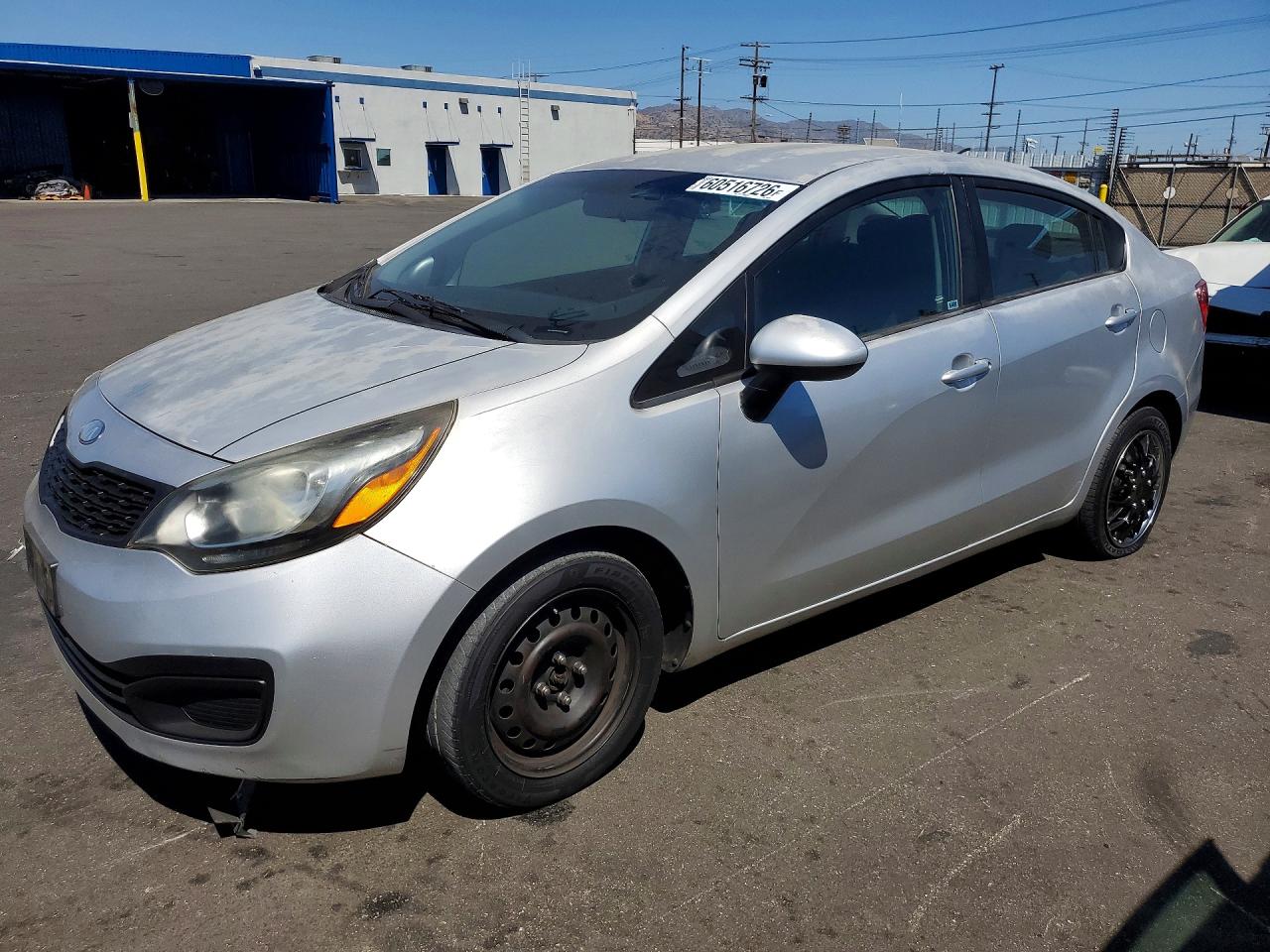 KNADM4A35E6354619 · 2014 KIA RIO