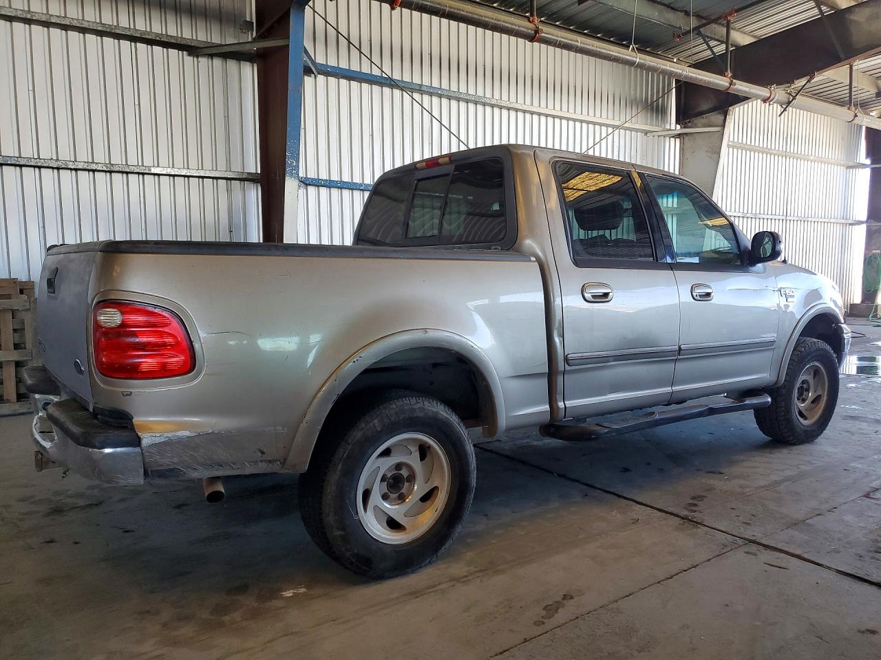 1FTRW08L41KB34987 · 2001 FORD F150 · 3/12