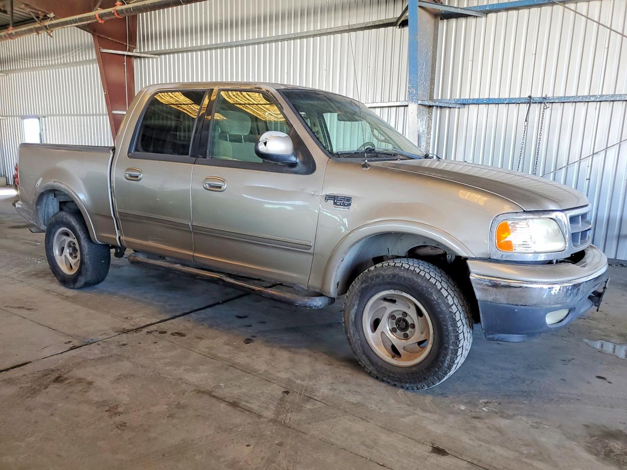 1FTRW08L41KB34987 · 2001 FORD F150 · 4/12