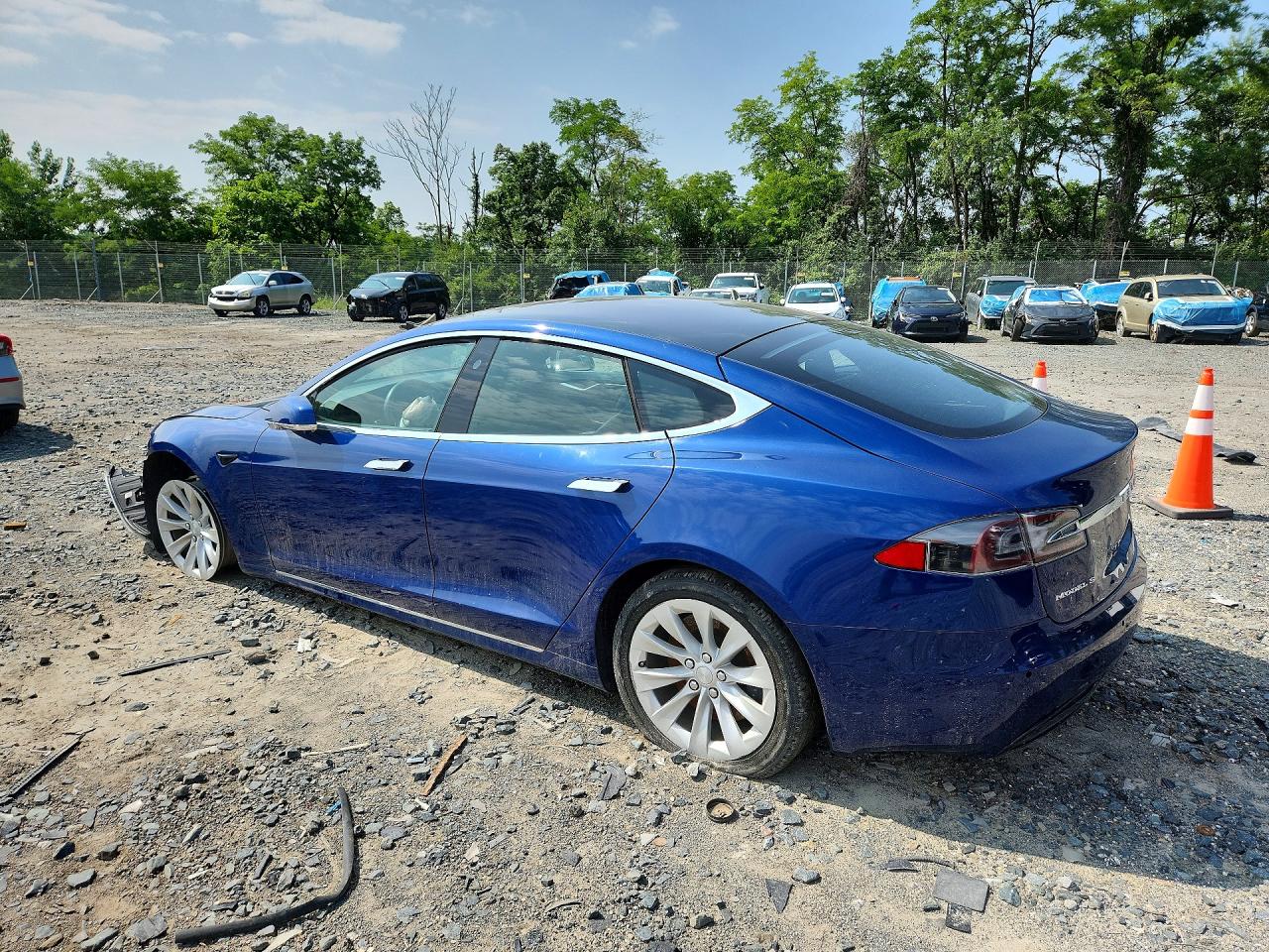 5YJSA1E1XHF208784 · 2017 TESLA MODEL S · 2/14