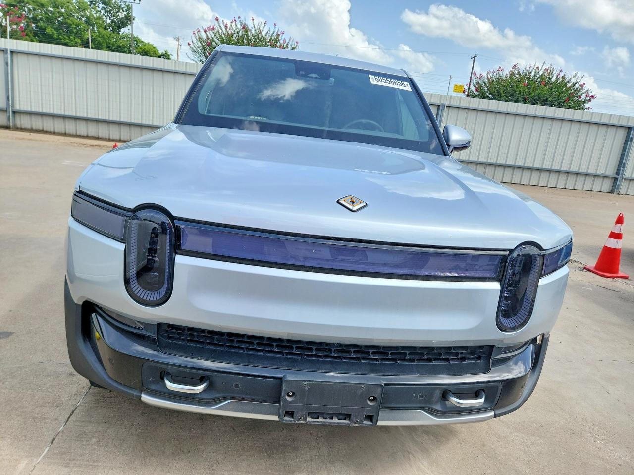 7FCTGAAA9PN019563 · 2023 RIVIAN R1T · 5/12