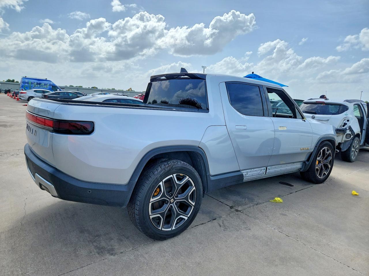 7FCTGAAA9PN019563 · 2023 RIVIAN R1T · 3/12