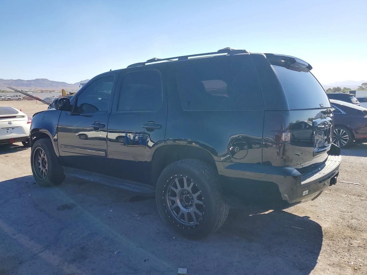 1GNSCBE07ER133658 · 2014 CHEVROLET TAHOE · 2/14