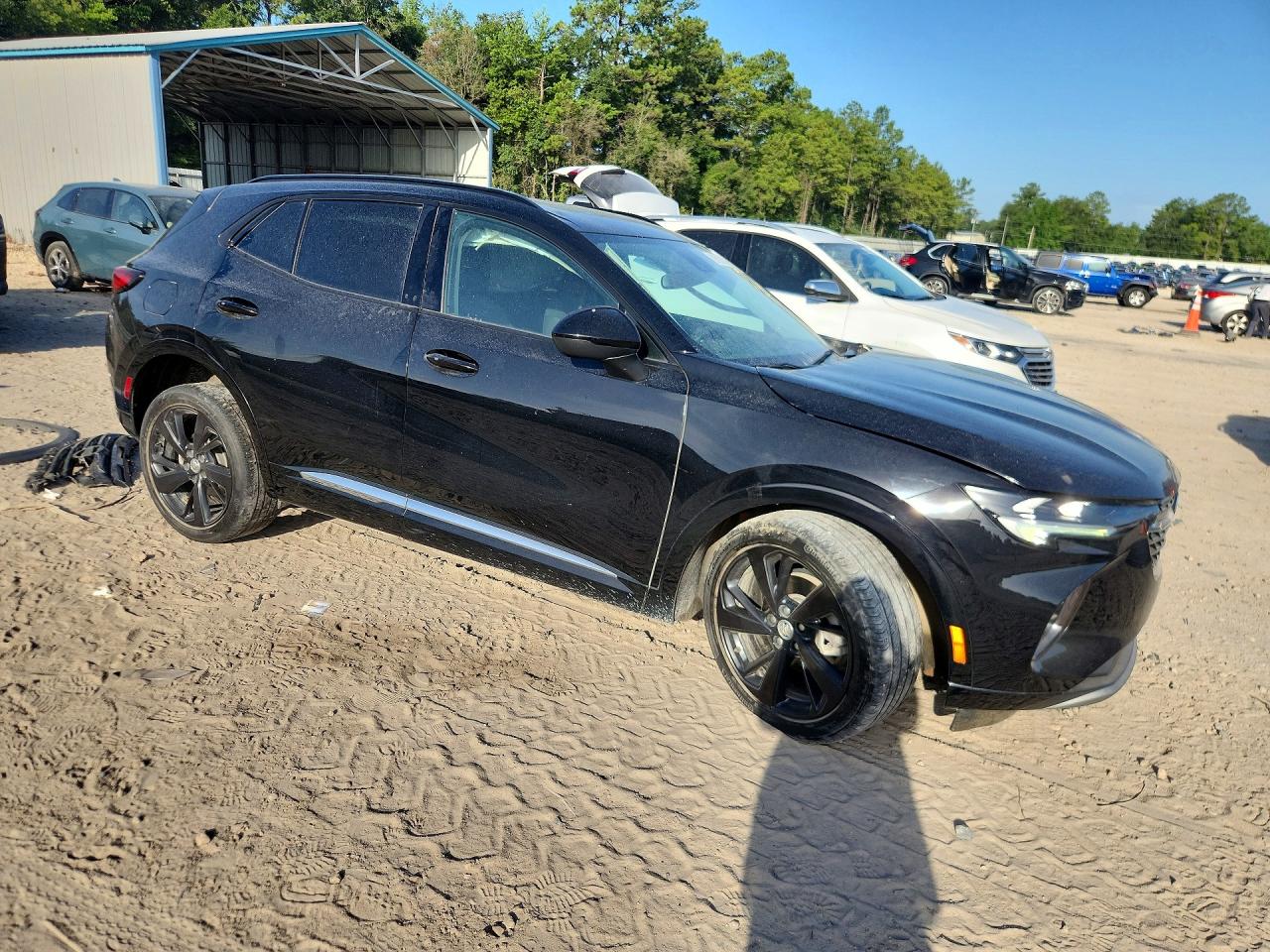 LRBAZLR42PD037988 · 2023 BUICK ENVISION · 4/14