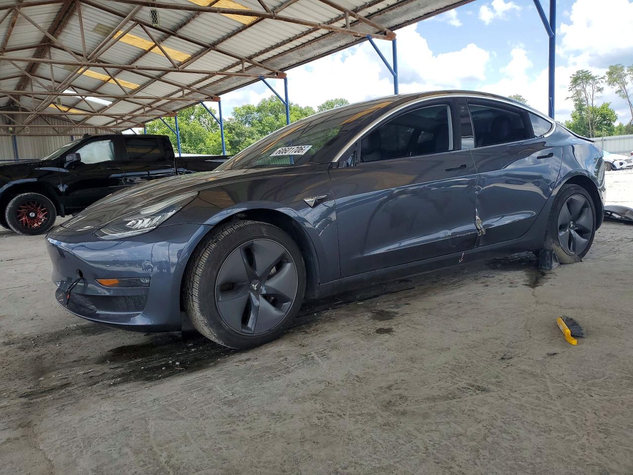 5YJ3E1EA1JF058319 · 2018 TESLA MODEL 3