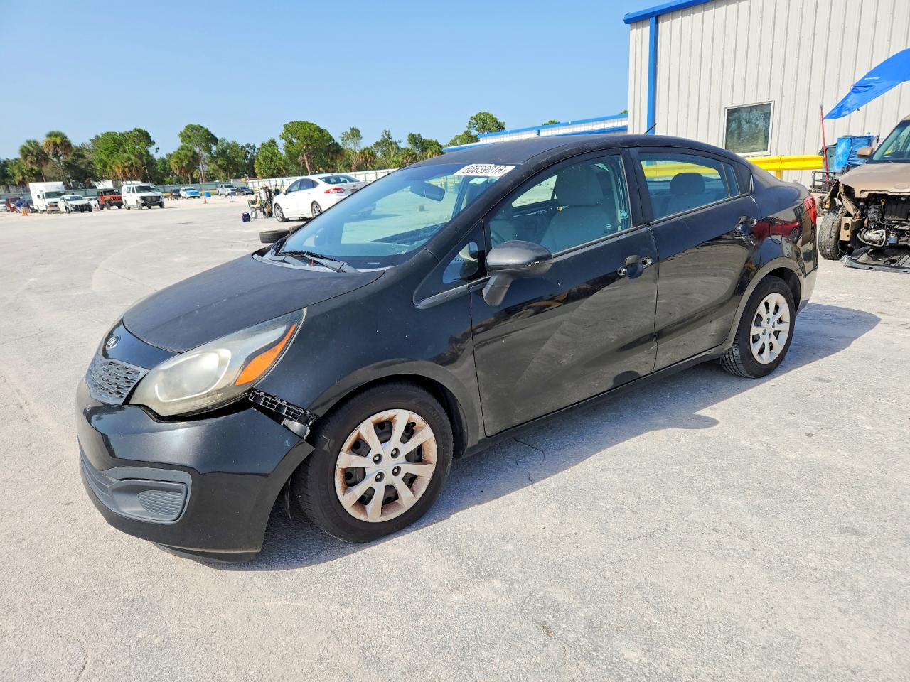KNADM4A30F6487225 · 2015 KIA RIO