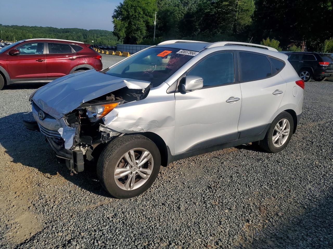 KM8JU3AC9DU572245 · 2013 HYUNDAI TUCSON