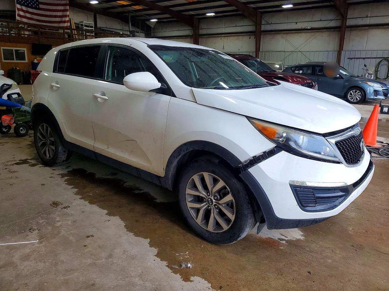 KNDPB3AC5E7589709 · 2014 KIA SPORTAGE · 4/12