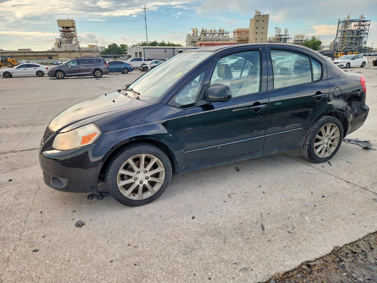 JS2YC5A21B6303012 · 2011 SUZUKI SX4