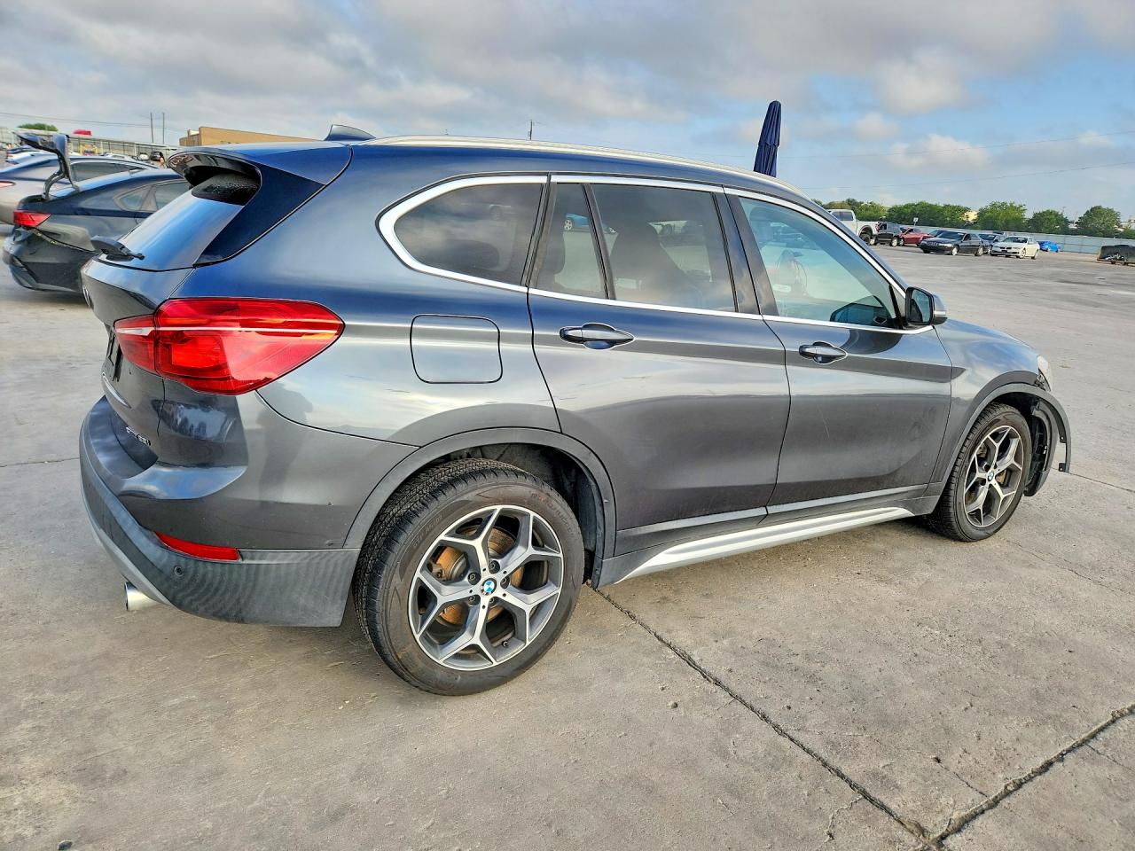 WBXHU7C35J3H42440 · 2018 BMW X1 · 3/12