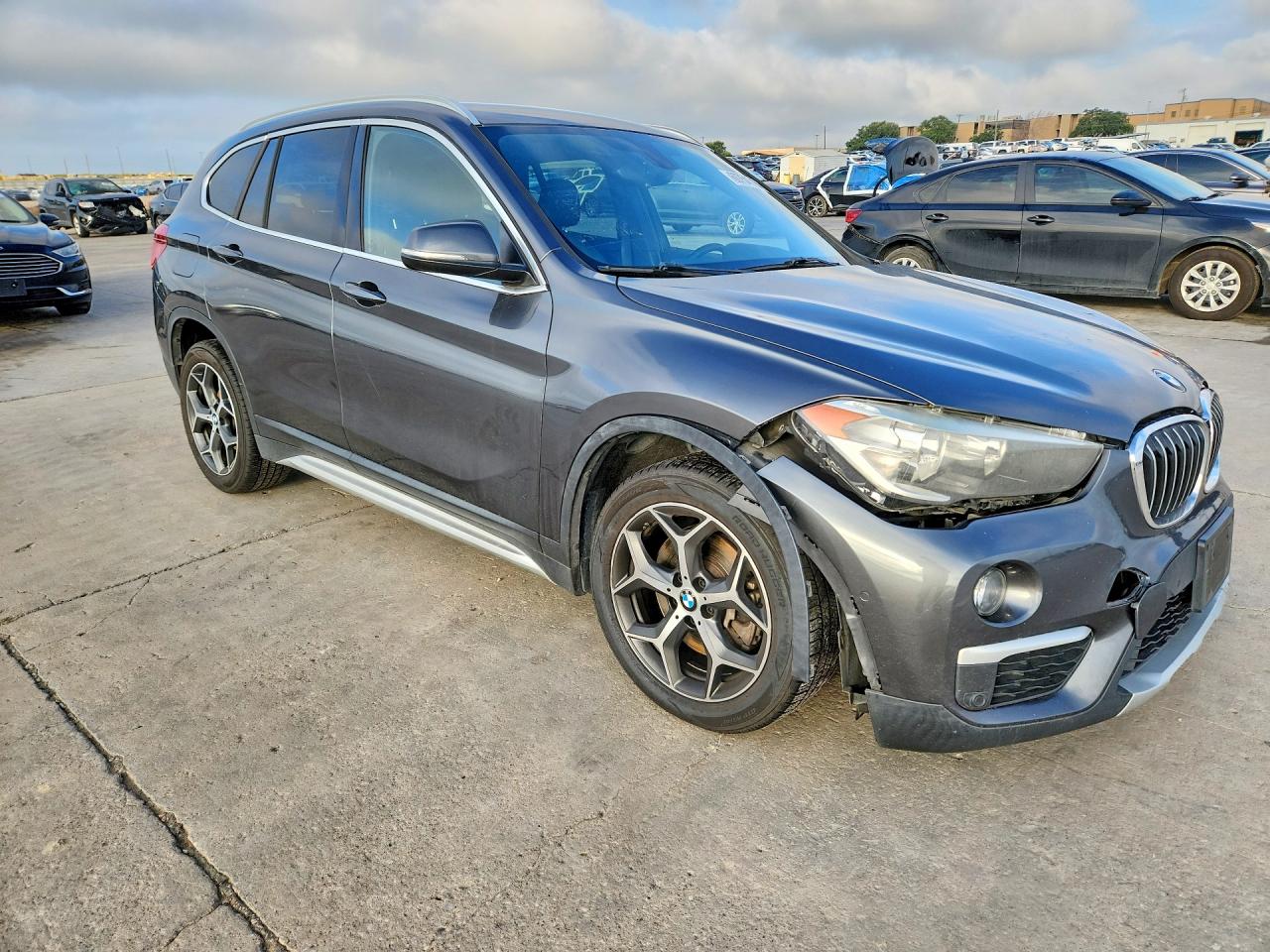 WBXHU7C35J3H42440 · 2018 BMW X1 · 4/12
