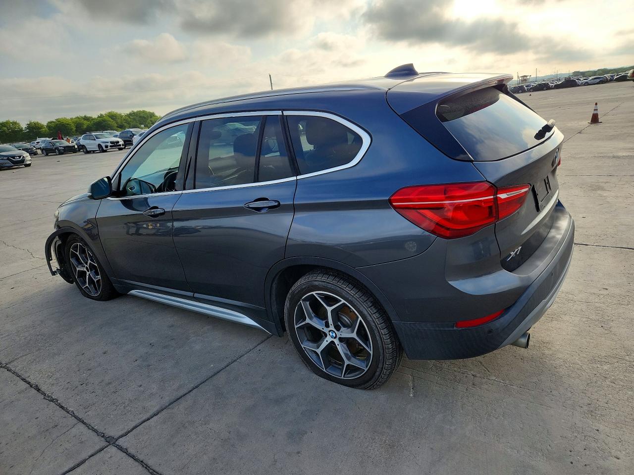 WBXHU7C35J3H42440 · 2018 BMW X1 · 2/12