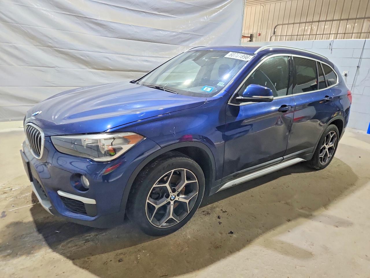 WBXHT3C34J3H33451 · 2018 BMW X1