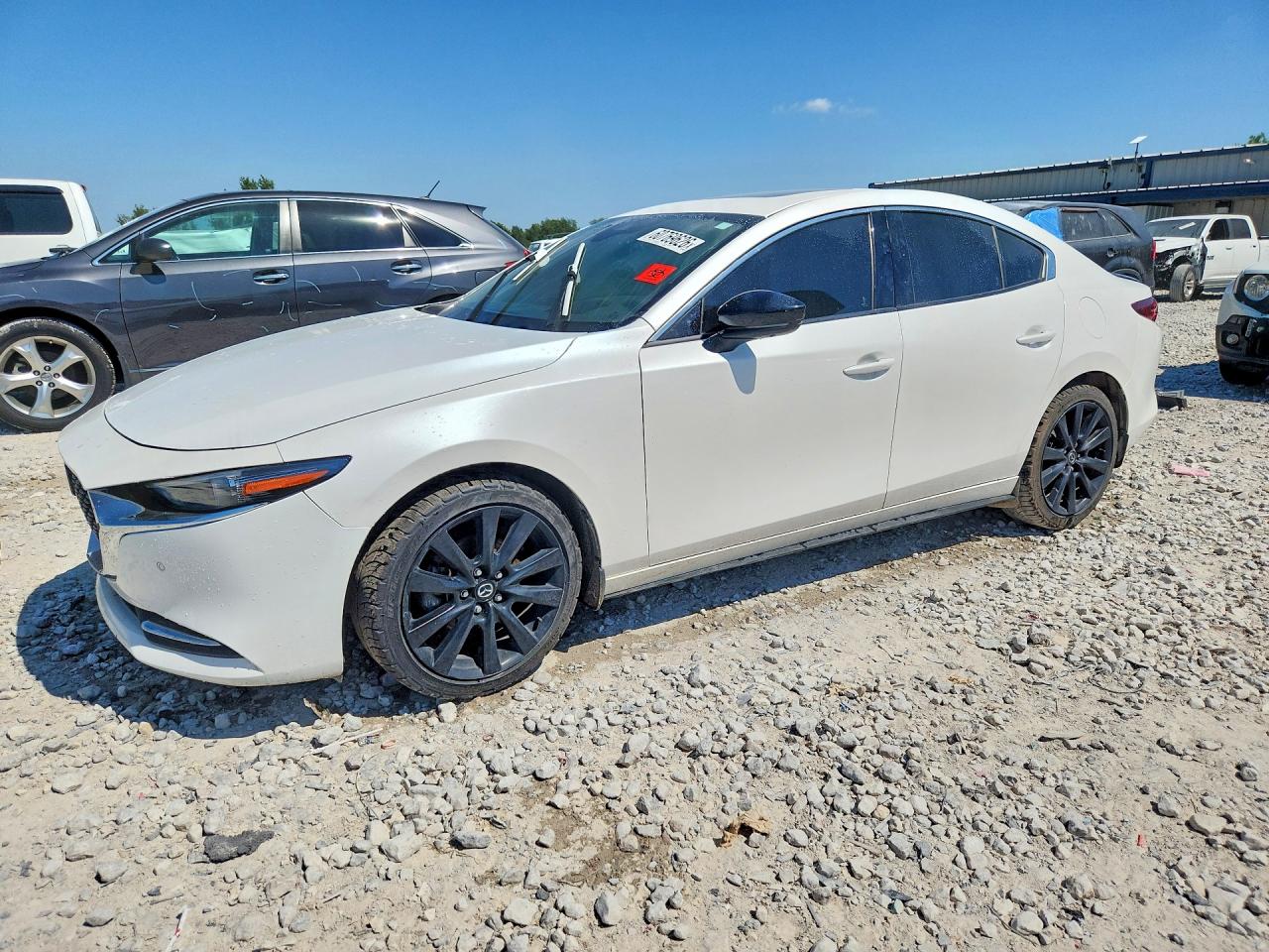 JM1BPBEY5M1316668 · 2021 MAZDA 3