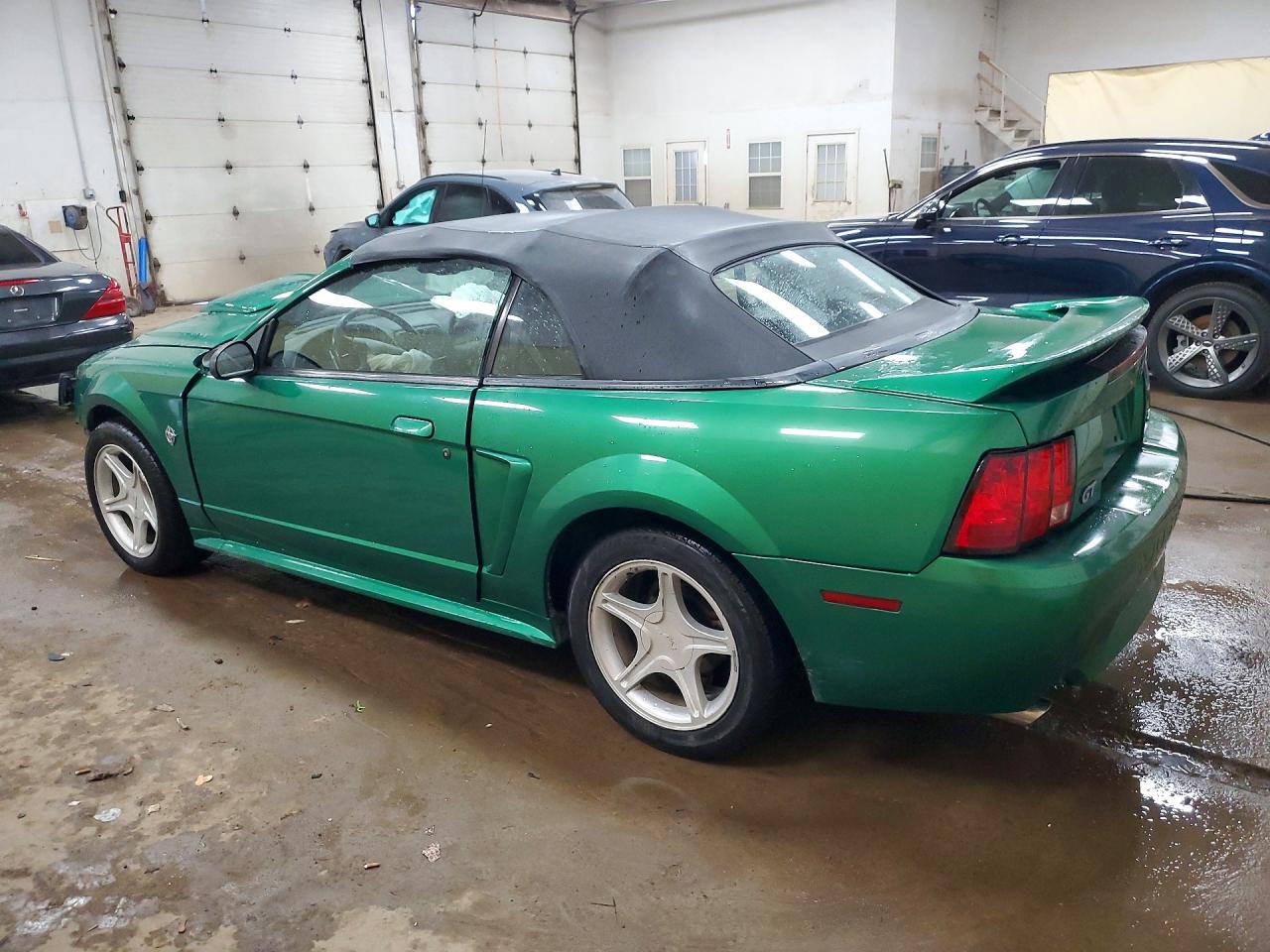1FAFP45X4XF211945 · 1999 FORD MUSTANG · 2/13