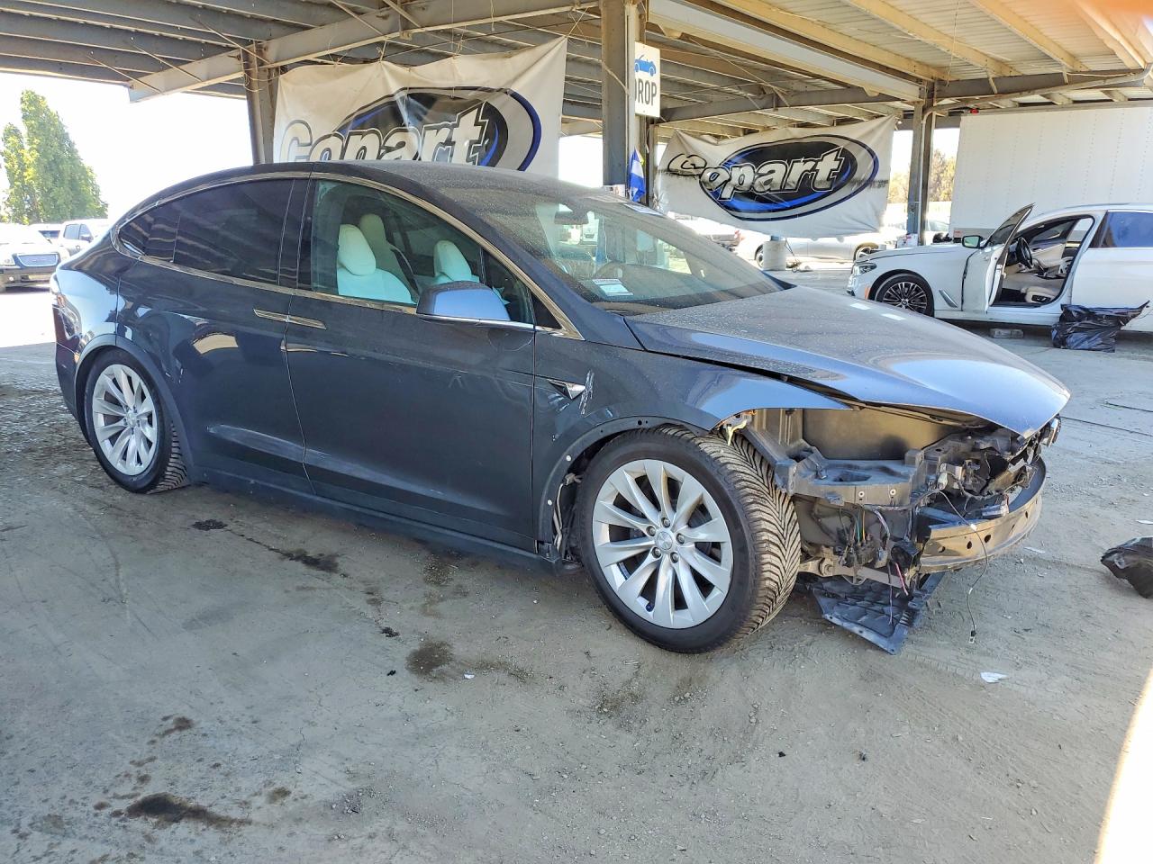 5YJXCBE27HF044392 · 2017 TESLA MODEL X · 4/14