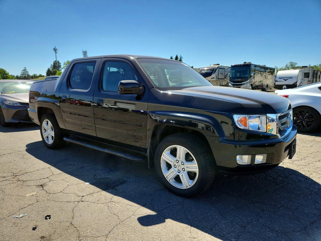 5FPYK1F52AB013543 · 2010 HONDA RIDGELINE · 4/12