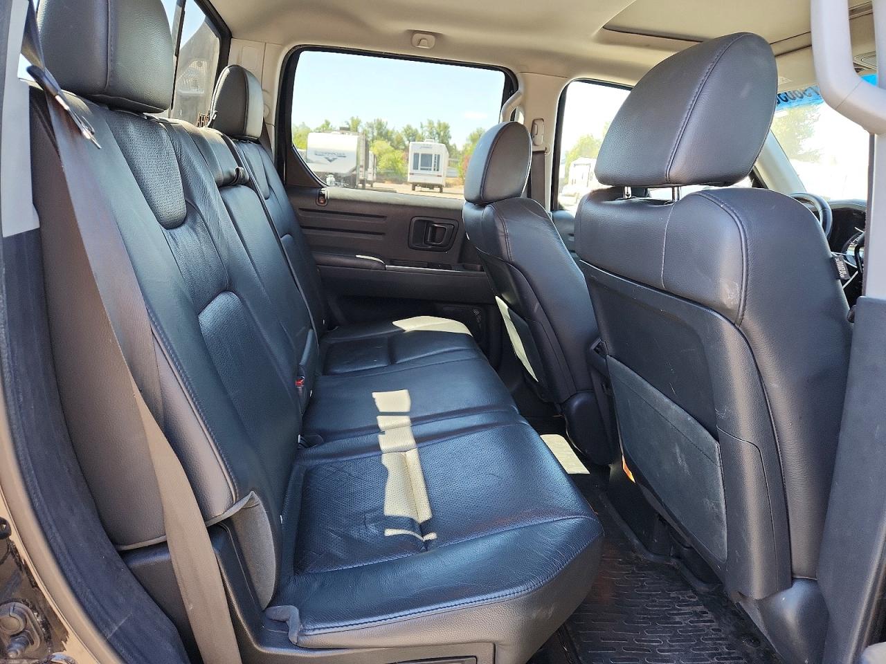 5FPYK1F52AB013543 · 2010 HONDA RIDGELINE · 10/12