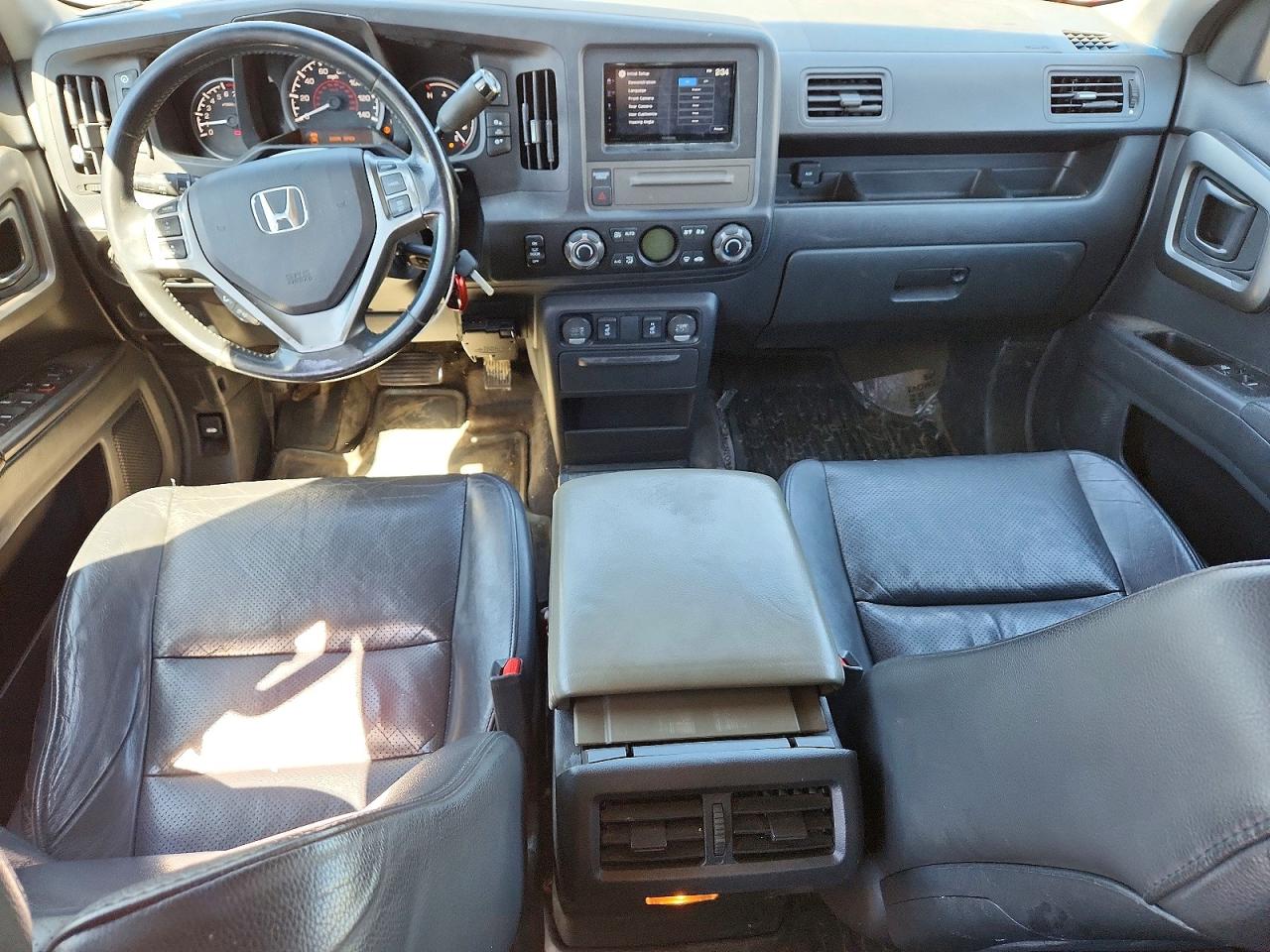 5FPYK1F52AB013543 · 2010 HONDA RIDGELINE · 8/12