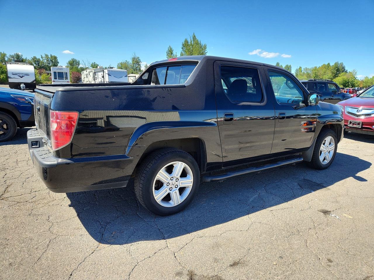 5FPYK1F52AB013543 · 2010 HONDA RIDGELINE · 3/12