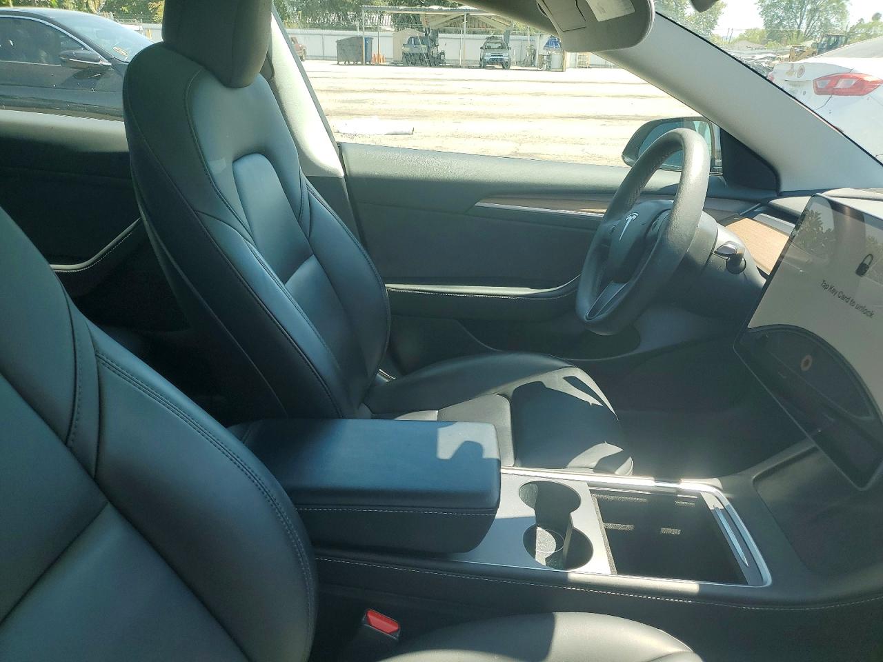 5YJ3E1EA7MF074710 · 2021 TESLA MODEL 3 · 8/12