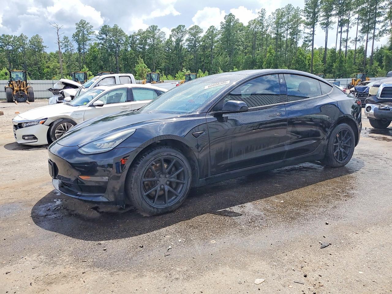 5YJ3E1EA5JF039014 · 2018 TESLA MODEL 3