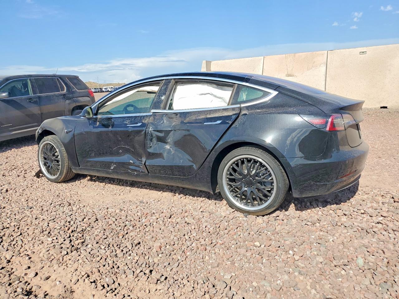 5YJ3E1EA0JF178029 · 2018 TESLA MODEL 3 · 2/12
