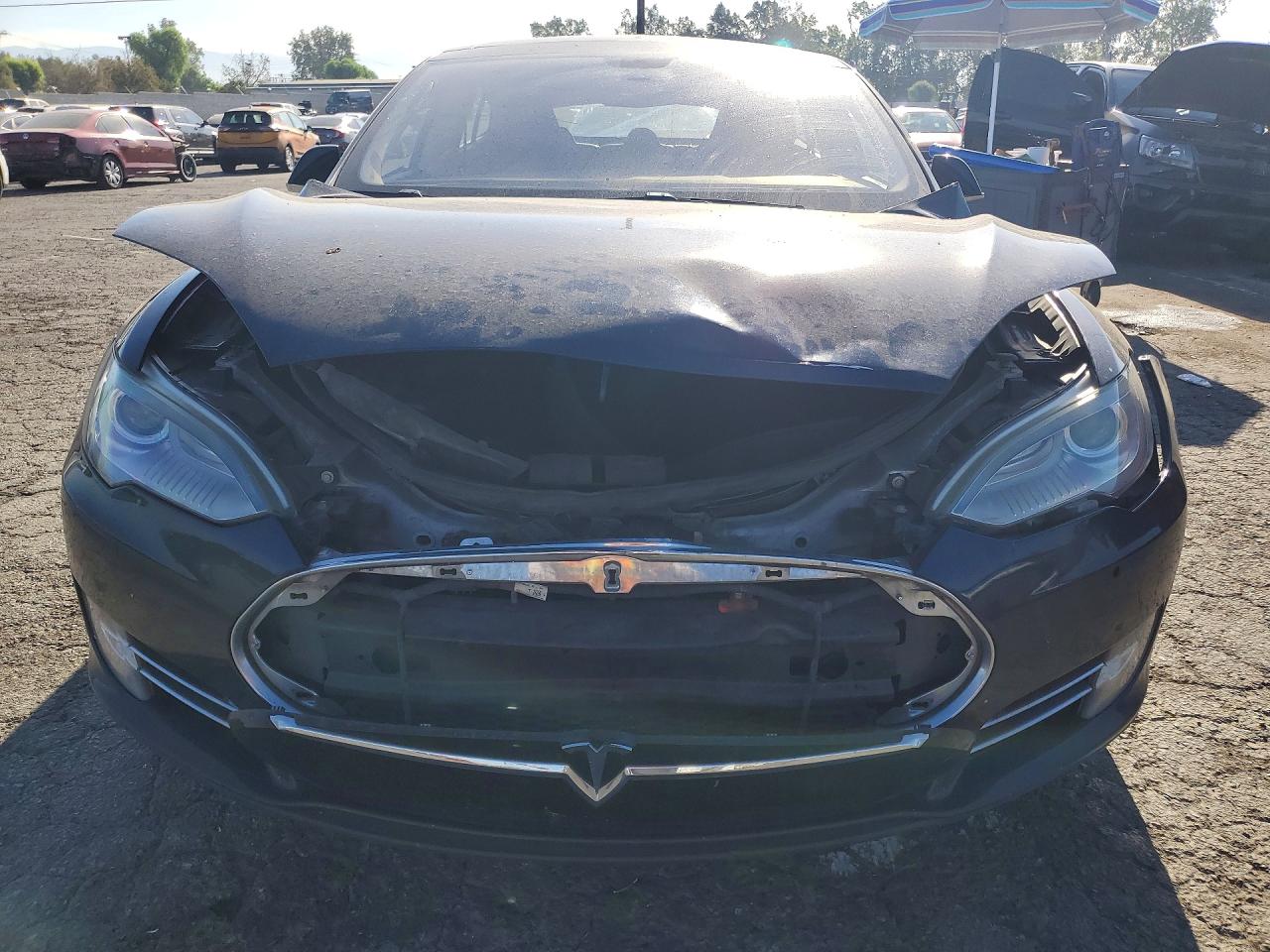5YJSA1S17EFP32698 · 2014 TESLA MODEL S · 5/12
