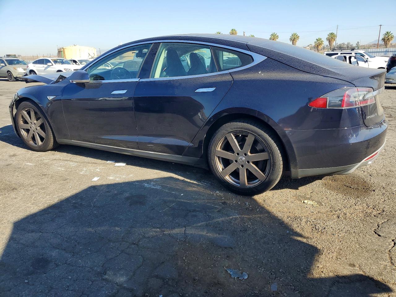5YJSA1S17EFP32698 · 2014 TESLA MODEL S · 2/12