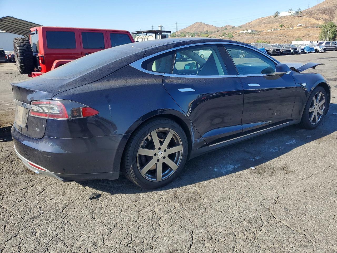 5YJSA1S17EFP32698 · 2014 TESLA MODEL S · 3/12