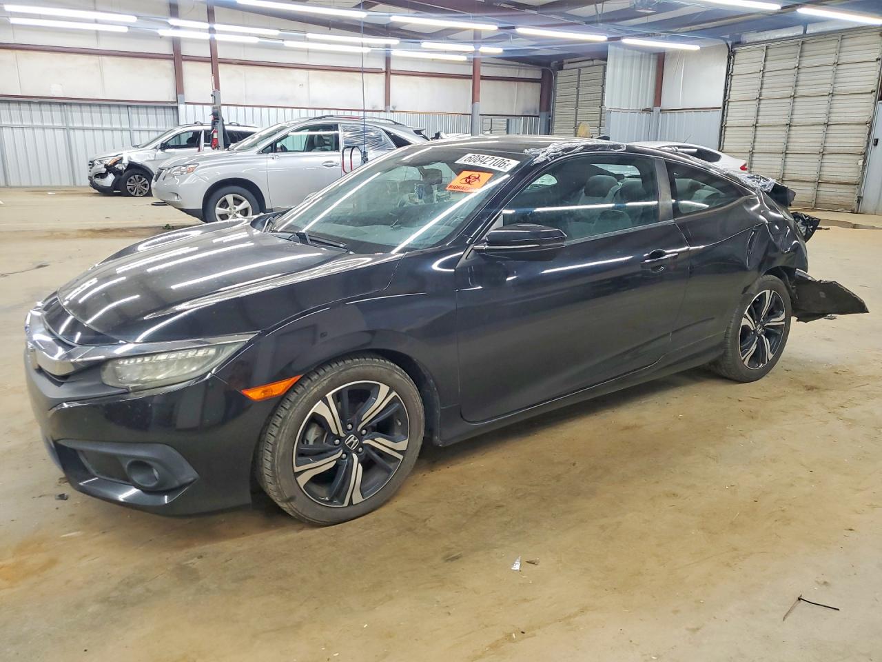 2HGFC3B94GH357414 · 2016 HONDA CIVIC TOURING