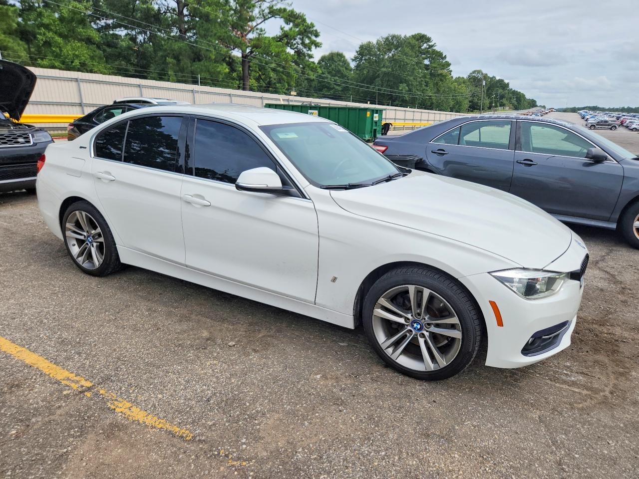 WBA8E1C50JA178243 · 2018 BMW 330E · 4/12