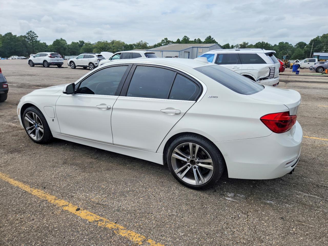 WBA8E1C50JA178243 · 2018 BMW 330E · 2/12