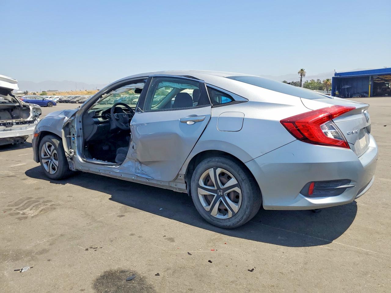 2HGFC2F55GH567103 · 2016 HONDA CIVIC · 2/13