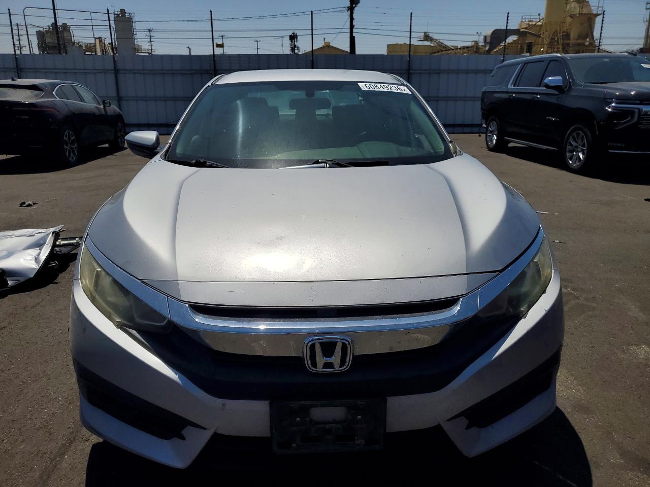 2HGFC2F55GH567103 · 2016 HONDA CIVIC · 5/13