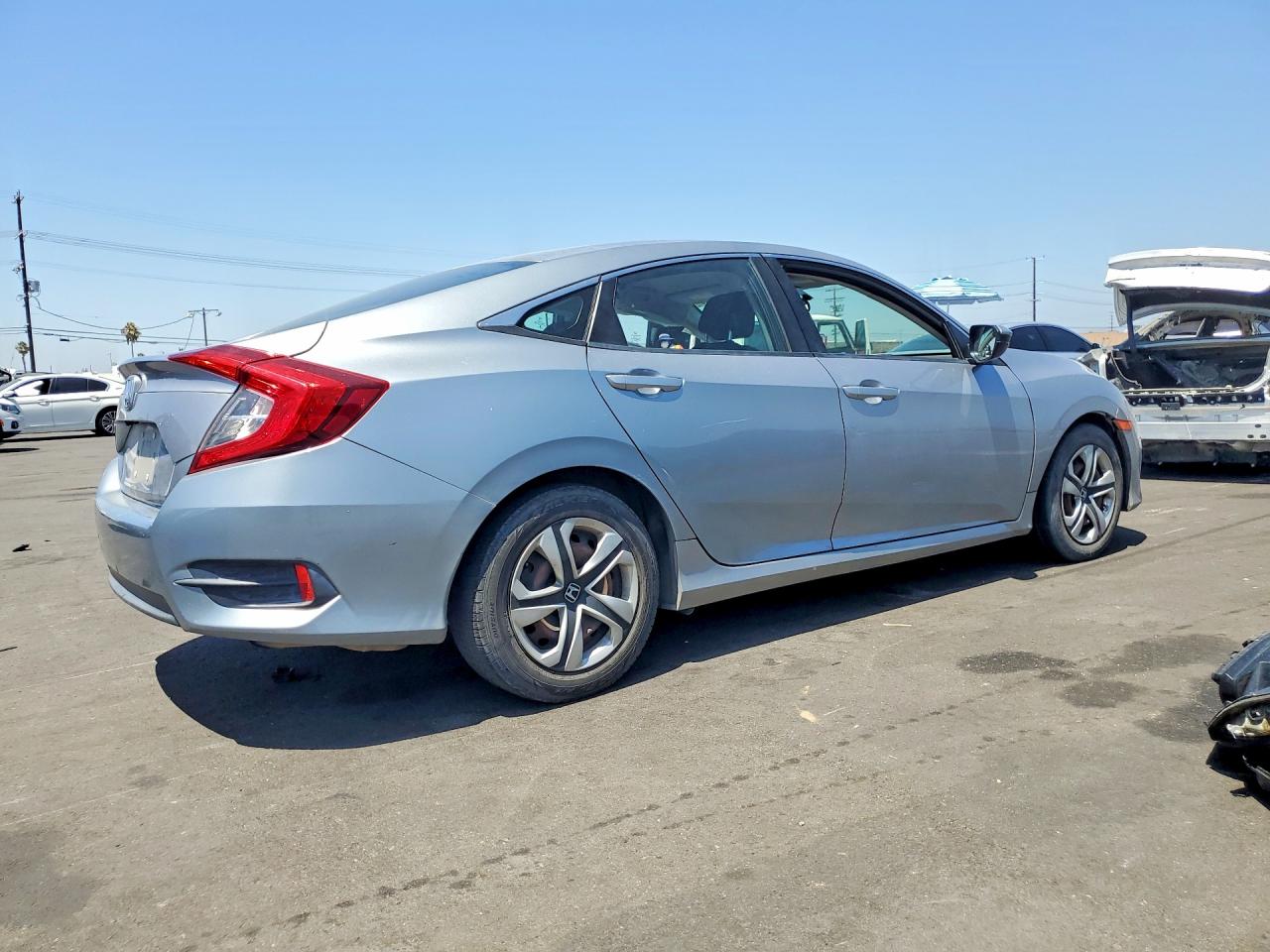 2HGFC2F55GH567103 · 2016 HONDA CIVIC · 3/13