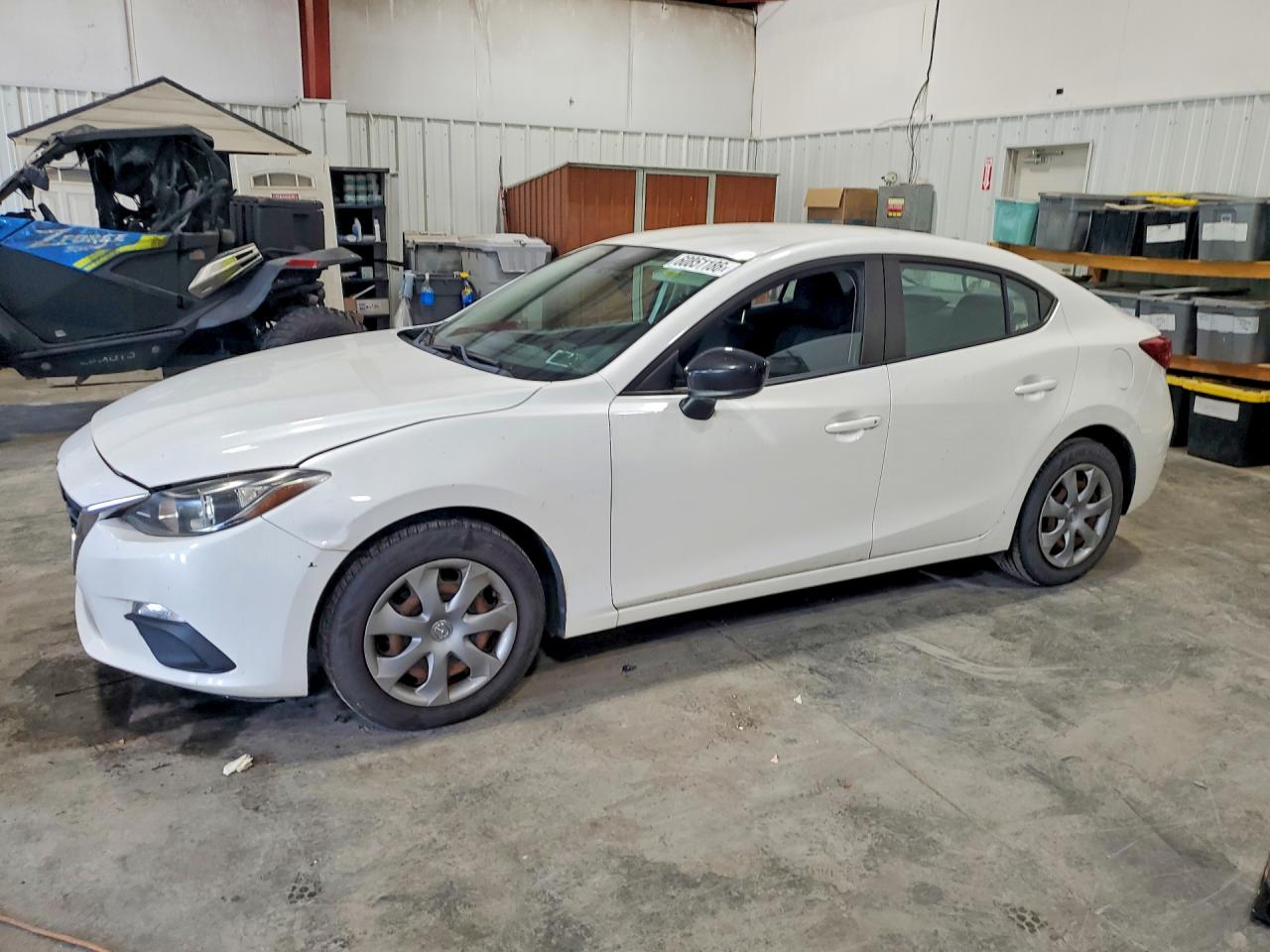JM1BM1T76E1134587 · 2014 MAZDA 3