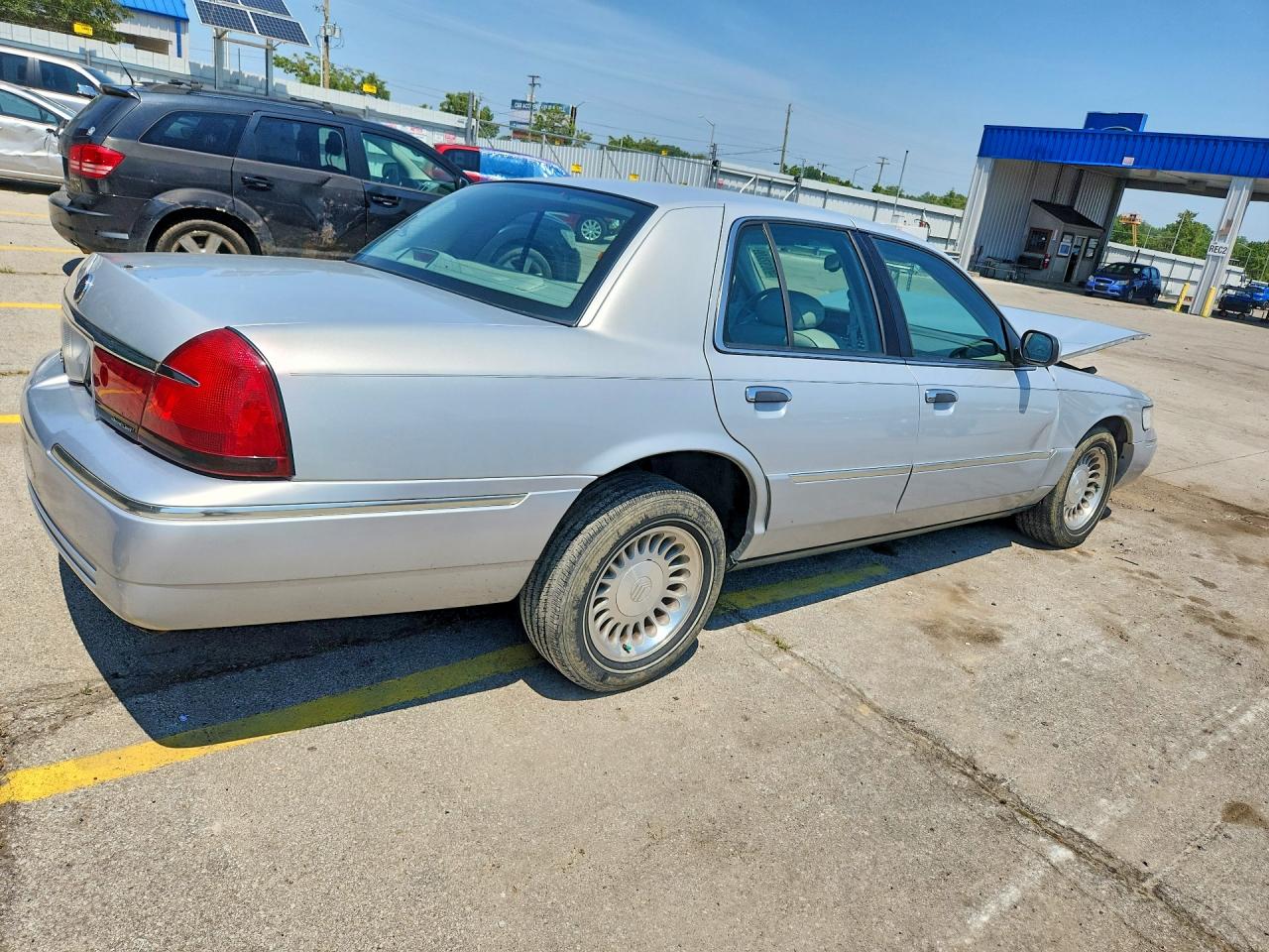 2MEFM75WX1X710934 · 2001 MERCURY GRAND MARQUIS · 3/12