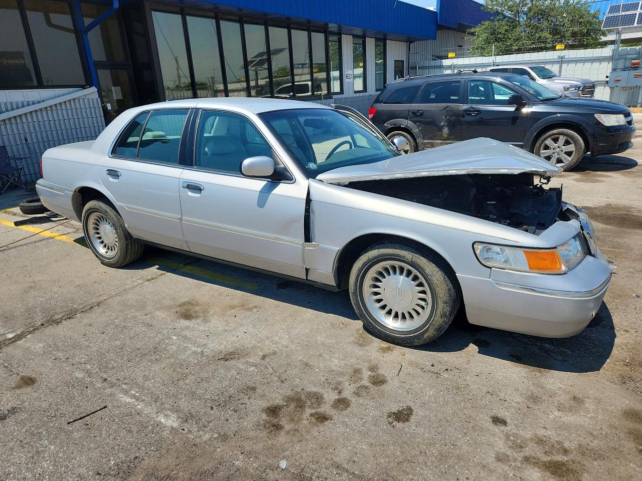 2MEFM75WX1X710934 · 2001 MERCURY GRAND MARQUIS · 4/12