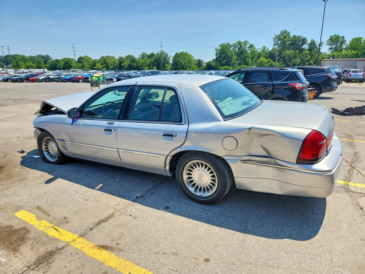 2MEFM75WX1X710934 · 2001 MERCURY GRAND MARQUIS · 2/12