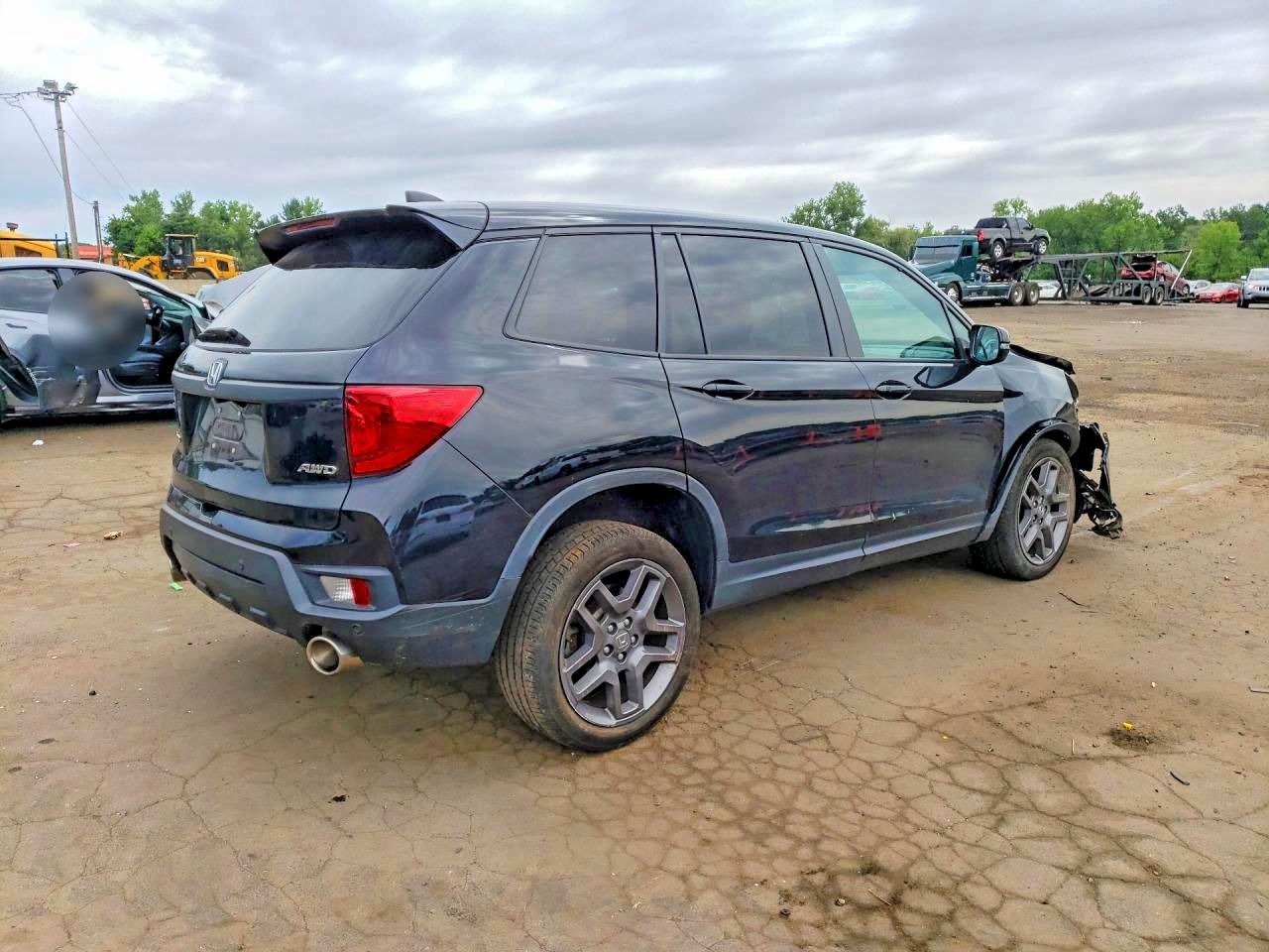 5FNYF8H58PB043111 · 2023 HONDA PASSPORT · 3/14