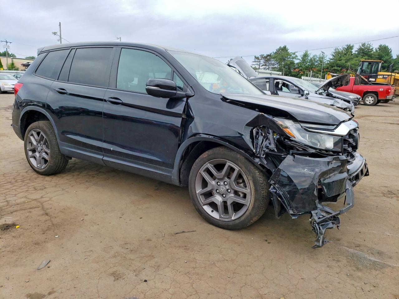5FNYF8H58PB043111 · 2023 HONDA PASSPORT · 4/14