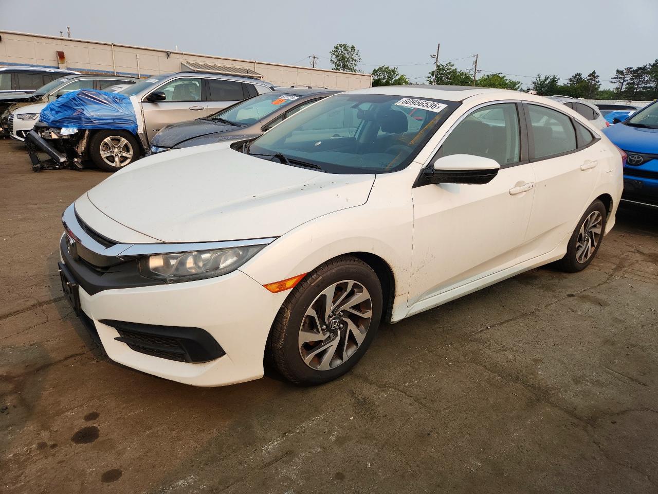 2HGFC2F71JH518411 · 2018 HONDA CIVIC