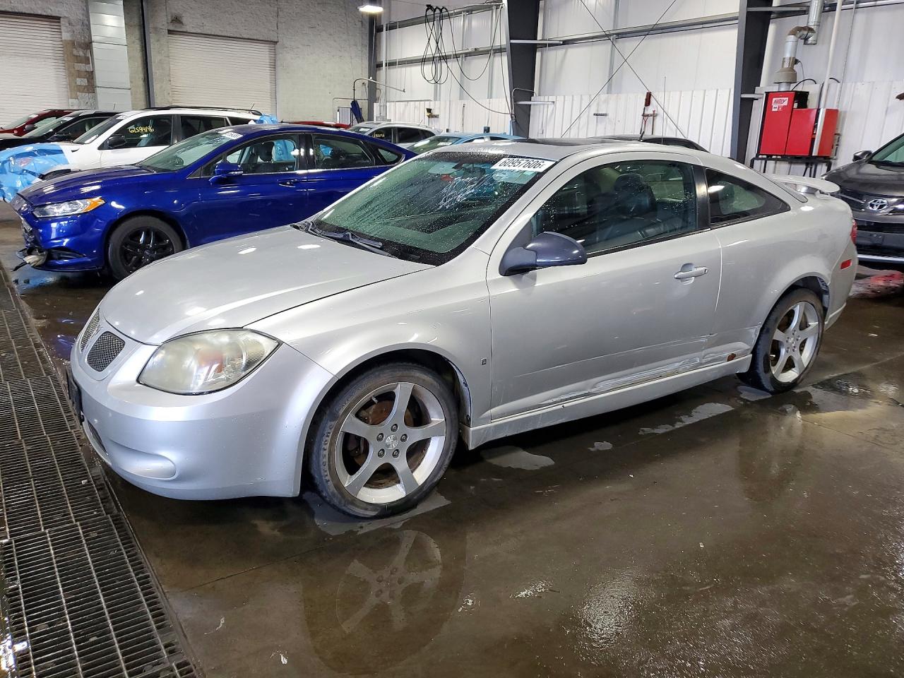 1G2AT18H997241057 · 2009 PONTIAC G5